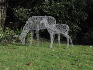 Wire deer sculpture and wire fawn