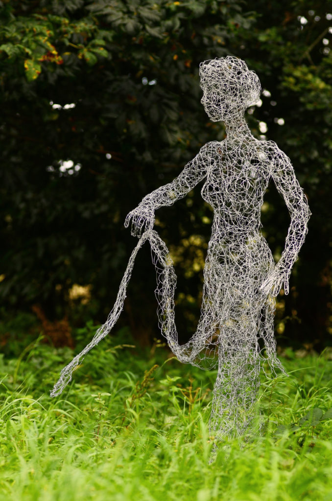 Handmade sculpture of dancing figure made from wire